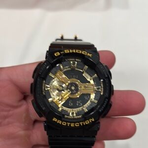 Casio G-Shock Black and Gold Timepiece